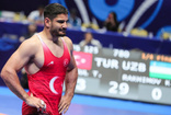 Taha Akgül, serbest stil 125kg yarı finalinde kaybetti